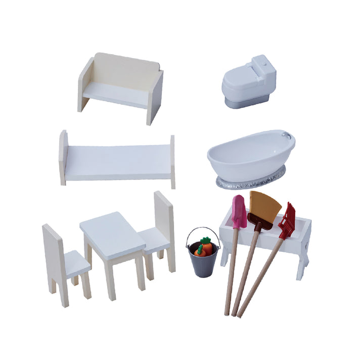 Accessories for the dollhouse: white toilet, bathtub, sofa, bed, two chairs and table, bucket with carrots, shovel, broom, rake and trough.