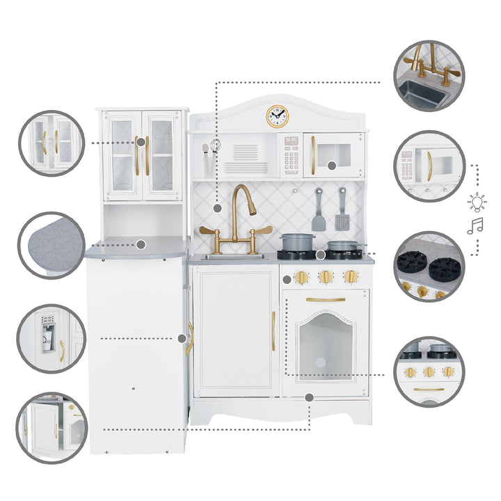 Specific features: a cabinet with windows and golden handles, a faux gray countertop, an interactive ice dispenser, illustrated beadboard, knobs that twist and make noise, two pretend burners, a microwave, and a farmhouse-style sink.