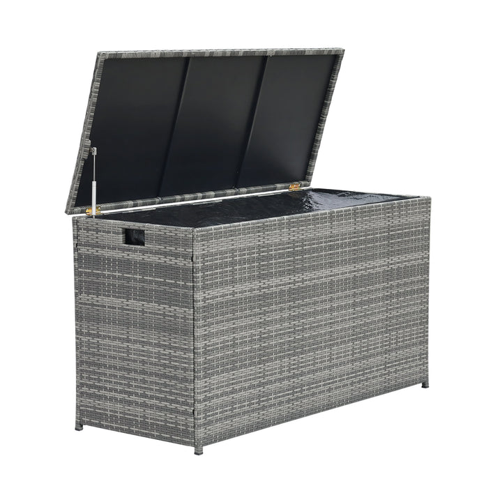 Teamson Home Gray PE Rattan 154-Gallon Outdoor Deck Box with the lid open and the protective lining visible