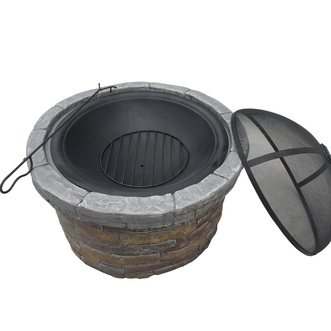 A Teamson Home 27" Outdoor Round Stone Wood Burning Fire Pit with Steel Base, Natural Stone with a metal grate and a protective mesh cover placed beside it, serves as exceptional outdoor decor.