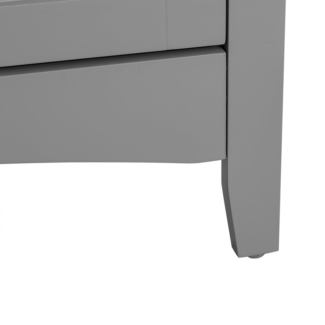 Close-up of the cabinet foot with a furniture slider on the bottom