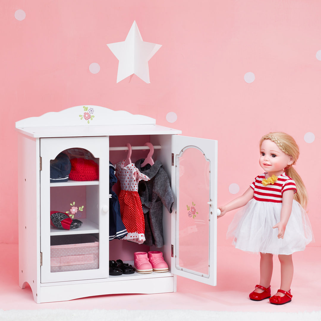 A Olivia's Little World Little Princess Toy Closet with Hangers for 18" Dolls, Gray/Pink standing next to a white closet, perfect as room decoration and storage.