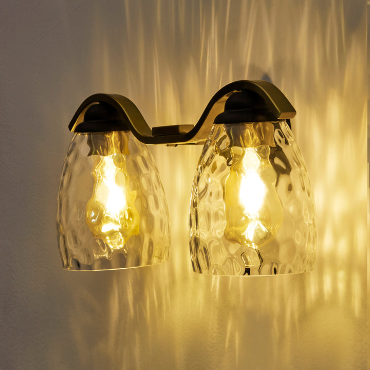 Clear Hammered Glass Cloche Shade from the side, illuminated  by a warm LED bulb