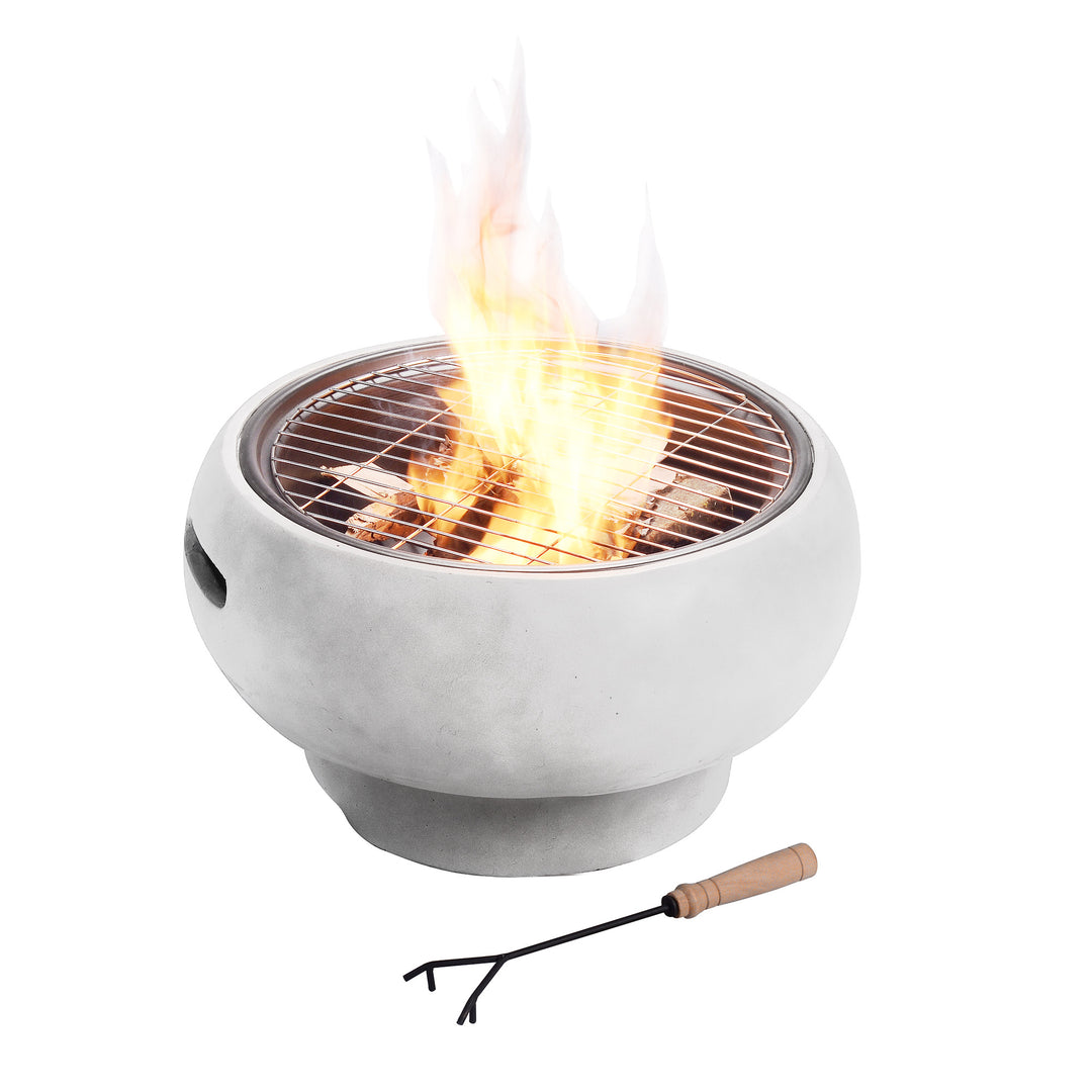 Portable Teamson Home 21" Outdoor Round Stone Wood Burning Fire Pit with Faux Concrete Base, Gray with visible flames and a poker tool on a white background.