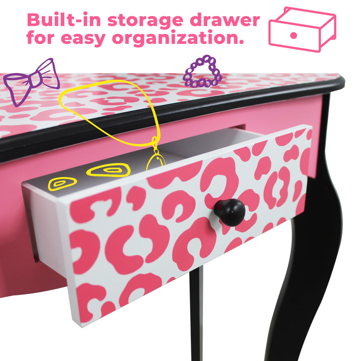 A pink drawer with a leopard print on it from Fantasy Fields Gisele Leopard Print Vanity Playset, Pink / Black.
