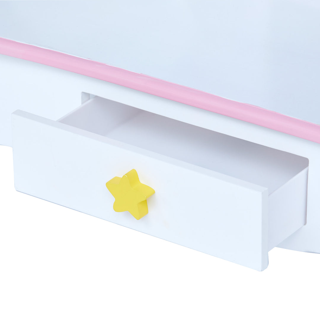 A close-up of a storage drawer with a star-shaped drawer pull