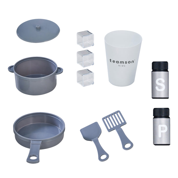 Grey kitchen accessories, including a pot, lid, frying pan, spatula, salt and pepper shaker and play ice cubes.