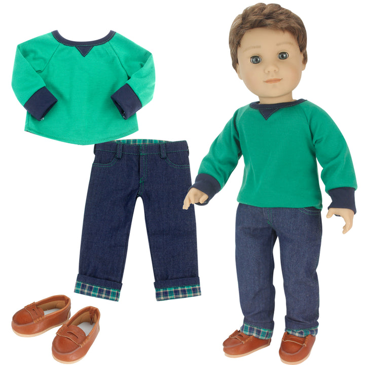 A doll dressed in a Sophia’s Shirt, Jeans, and Penny Loafers Set for 18" Boy Dolls includes a green sweater and jeans.