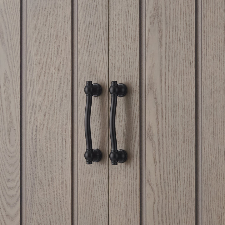 Close-up of colonial-style black pull handles