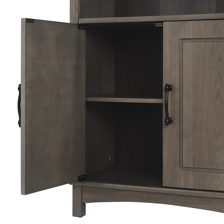 A close-up of the cabinet open with the shelf inside