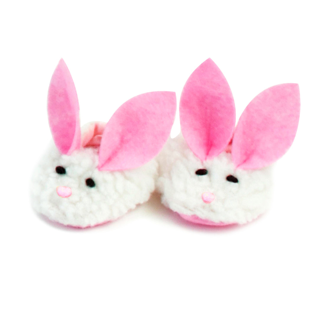 A pair of Sophia's Sherpa Bunny Slippers for 18 Inch Dolls in white with pink ears on a white background.