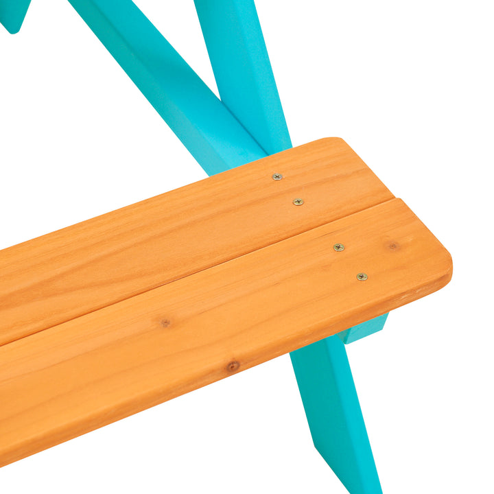 A close-up of a Teamson Kids Child Sized Wooden Outdoor Picnic Table with a turquoise metal frame against a white background.