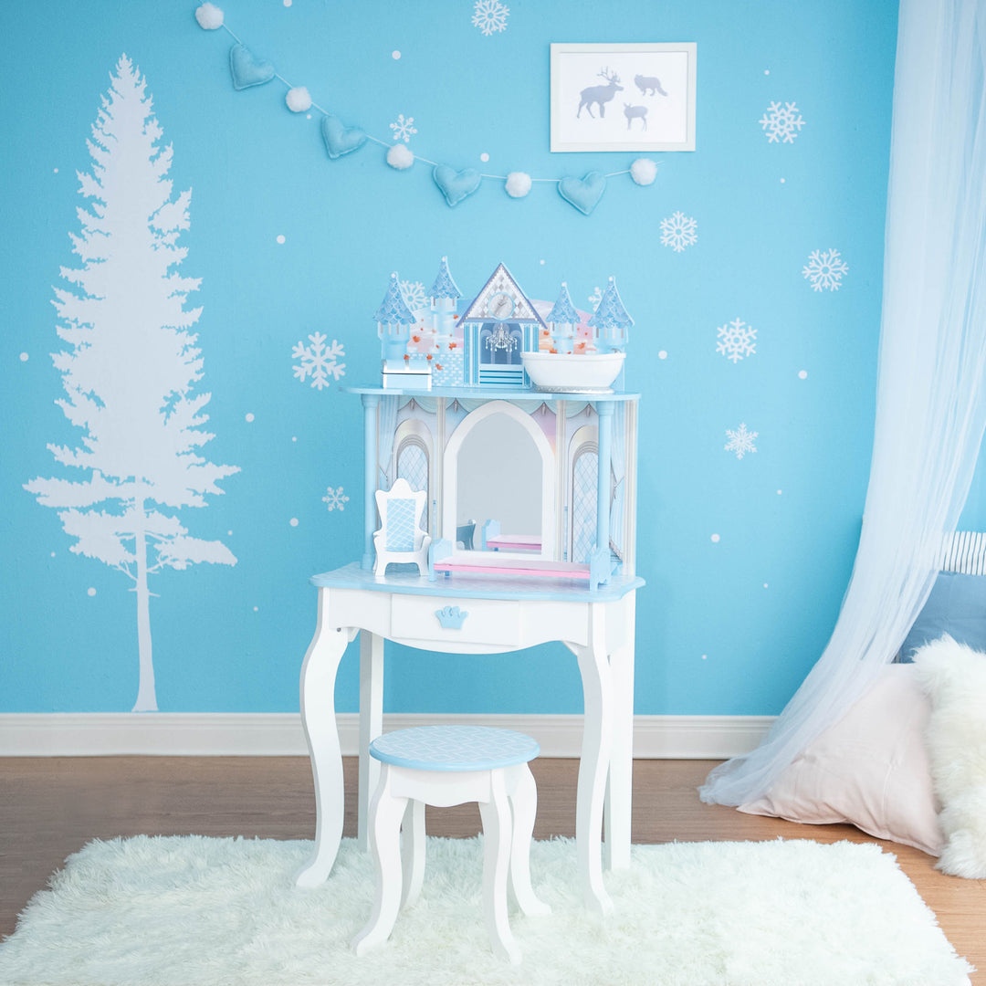 A girl's bedroom with awhite and blue Vanity Set with stool and a white and blue throne, blue and pink bed, white bathtub, and a blue and white chest sized for 12" dolls.
