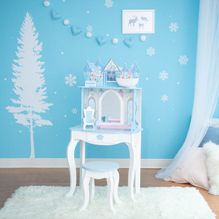 A girl's bedroom with awhite and blue Vanity Set with stool and a white and blue throne, blue and pink bed, white bathtub, and a blue and white chest sized for 12" dolls.