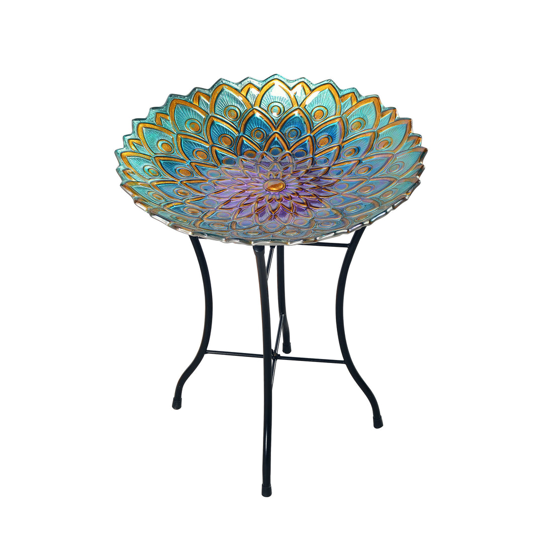 A colorful Teamson Home 18" Multi-colored Glass Mosaic Flower Bird Bath with a durable metal stand.