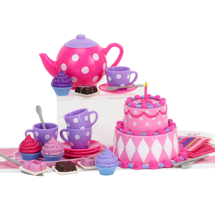 A tea set sized for 18" dolls with pink and purple teapot, tea cups, detailed deserts and napkins