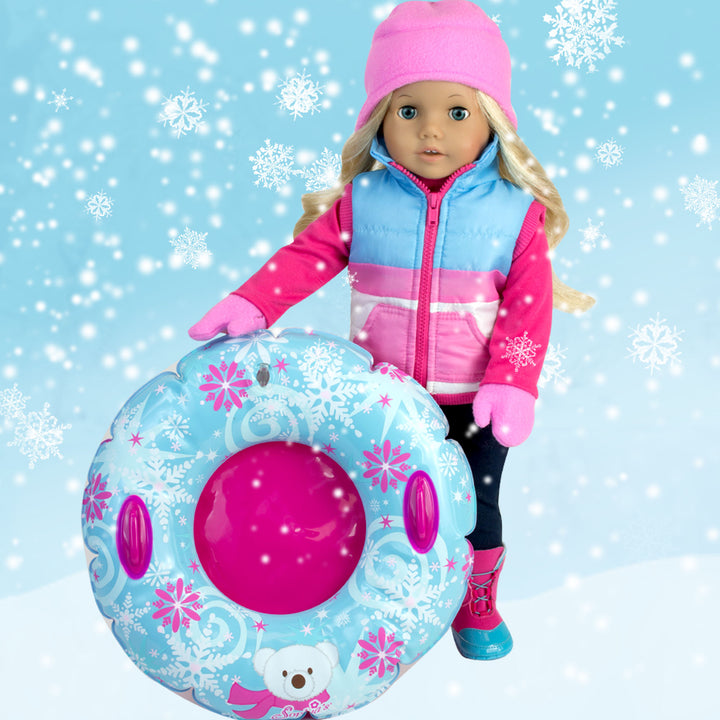 A doll wearing Sophia’s Winter Outfit and Inner Tube Set for 18" Dolls standing next to a float.