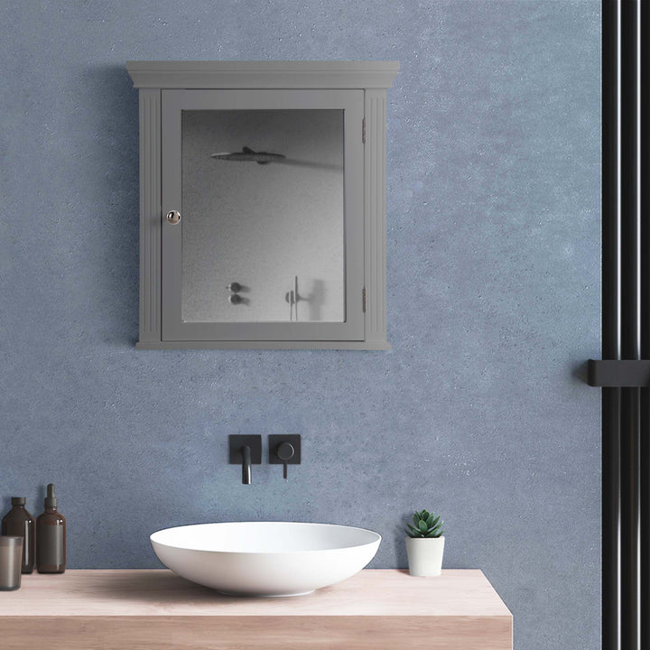A modern bathroom with a foggy mirror above a vessel sink, reflecting a blurred image of bathroom fixtures and the Gray Teamson Home Removable Mirrored Medicine Cabinet