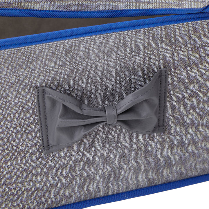 Close-up of a bow accent on the Teamson Home Fabric Storage Cubes with Lids, Gray with Blue Trim